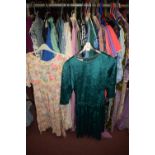 A quantity of Victorian and later style dresses for theatre of various styles and materials.