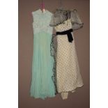 Two 1960's dresses, one in green with floral decoration,