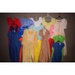 Early 19th Century style dresses for the theatre of varying colours.