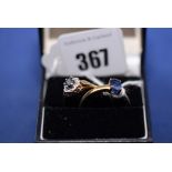 A sapphire and diamond cluster ring; together with a single stone sapphire ring, both on 9ct.