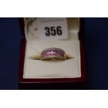 A pink sapphire and diamond ring,