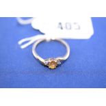 A citrine and diamond ring, on 9ct. yellow gold shank, ring size S.