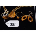 Tigers eye jewellery: two rings, size S; a pendant on chain; and a pair of drop earrings,