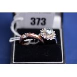 A topaz and diamond cluster ring, on 9ct. white gold shank; together with a morganite ring, on 9ct.