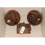 A carved wooden box and cover with bird finial decoration,