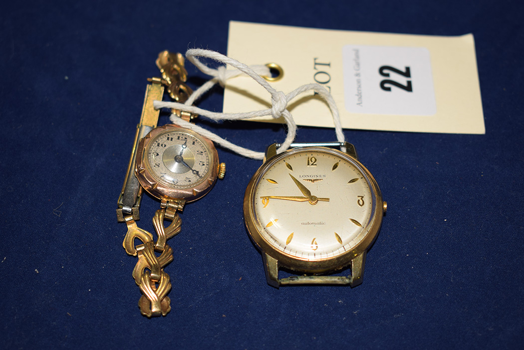 A lady's 9CT yellow gold Longines automatic wristwatch;