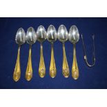 A set of six American sterling silver and gilt teaspoons and a pair of sugar tongs,