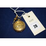 An 18ct. gold open faced fob watch, the dial with roman numerals in engine turned decorated case.