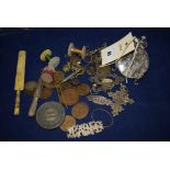 A quantity of pre decimal coinage; badges; an ivory letter opener; badges; and other items.