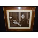 An original photograph of Winston Churchill making a wartime broadcast.
