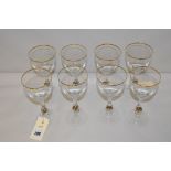 A set of eight wine glasses, by Atlas, Czechoslovakia, with gilt decoration..