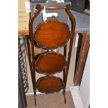 A 20th Century mahogany two-tier cake stand.
