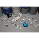 Swarovski ornaments, to include: a panda; a dog; a fox; a pig; and others.