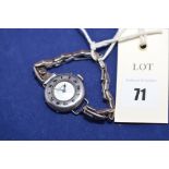 A ladies wrist watch by Asprey, set white metal stamped sterling silver.