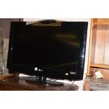 An LG flatscreen television, serial no. 906MAVD35391, with remote.