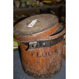 An early 20th Century painted metal flour bin; and a similar period mahogany boot jack.