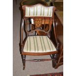 An Edwardian inlaid mahogany occasional chair,