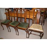 Three Queen Anne style stained wood dining chairs; together with a similar chair.