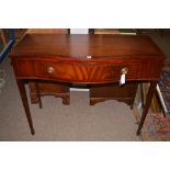 A reproduction mahogany side table fitted a frieze drawer, raised on square tapering legs, 106.