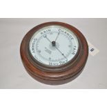 A 20th Century aneroid barometer, by James Lucking, Birmingham, in oak case.