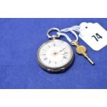 A silver fob watch with white enamel roman dial and engraved floral decoration to case