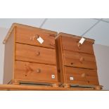 A pair of modern bedside chest of three drawers.