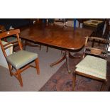 A late 19th Century mahogany extending dining table, one spare leaf,