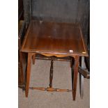 An Edwardian inlaid mahogany square occasional table, legs joined by stretchers, 56cms wide.