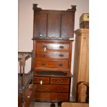 A late Victorian walnut chest of three drawers;