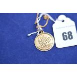 A 9ct yellow gold St. Christopher medal, on fine link chain, 4.5grms.