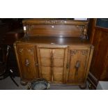 A 20th Century stained oak dining suite, comprising: draw leaf dining table, 106.