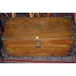 A camphor wood blanket box with brass mounts, top opening to reveal fitted compartment to side.