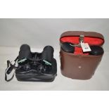 A pair of Janik 10 x 50 binoculars, numbered 355-140,