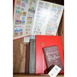 World stamps in the Strand stamp album and the Triumph stamp album; two stock books;