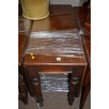 A Victorian mahogany drop-leaf dining table, 138cms wide.