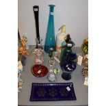 Coloured and clear glassware, to include: vases, paperweights and ashtray; and other items.