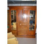 An Edwardian mahogany wardrobe;