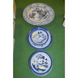 An 18th Century Delft plate (damaged); two later Delft plates;