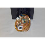 A Royal Crown Derby "Dragon of Happiness" No.385/1500, with gold stopper, boxed.