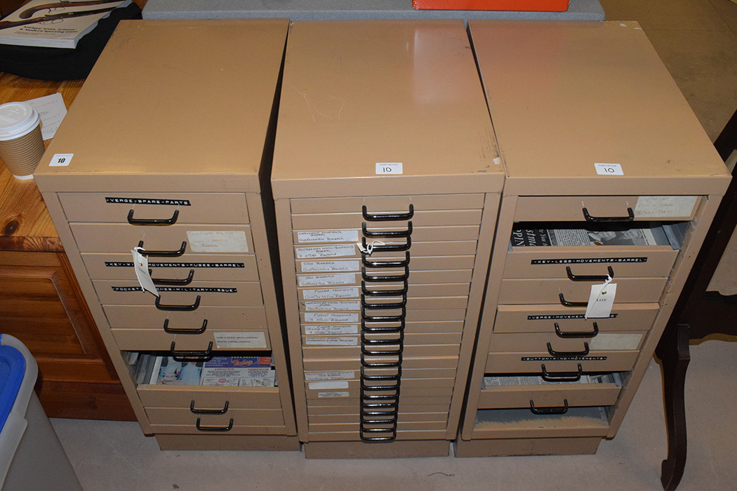 Three metal collectors cabinets (some drawers missing).