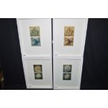 Transfer printed tiles of berries, leaves and sea shells, signed C.R. to mount, framed.