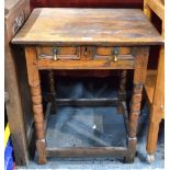 A late 17th/18th century oak side table,