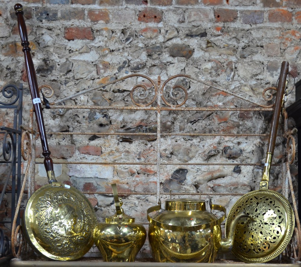 A late 17th century brass warming pan wi