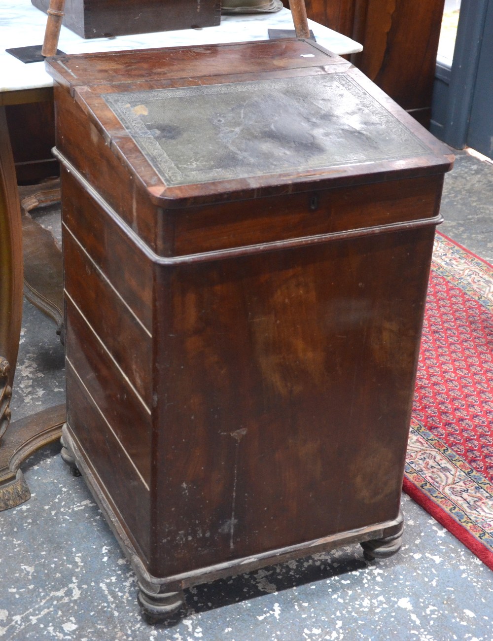 An early Victorian mahogany Davenport by T & G Seddon,