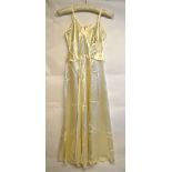 An early 20th century cream silk satin w