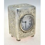 A late Victorian silver desk-clock, the