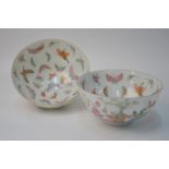 An elegant pair of Chinese famille rose bowls;