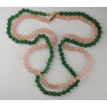 A single row of rose quartz beads to/w single row of green dyed aventurine beads both approx 80 cm