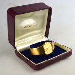 A Rolex Cellini 18k wristwatch with oblong gilt dial, case no 4203182, on flexible mesh bracelet