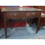 An 18th century oak two drawer gateleg side supper table, raised on moulded square legs with drop